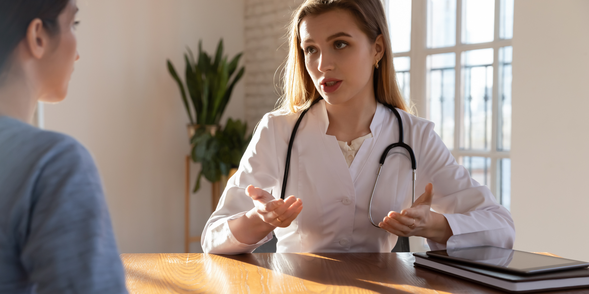 Nurse talking with a woman about her abortion options